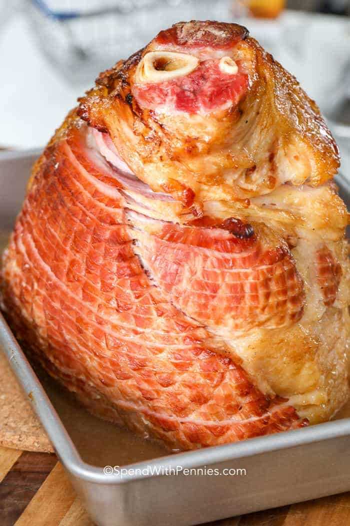 Preparing the ham for cooking in a roaster oven