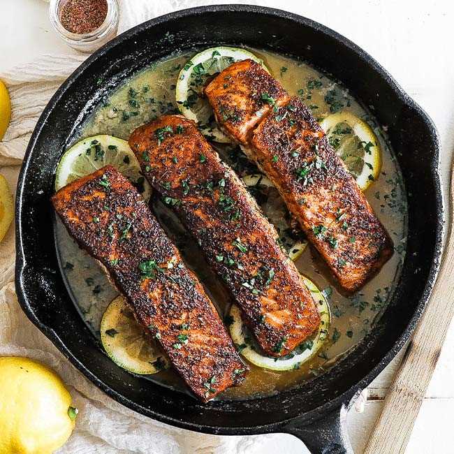 The cooking process for salmon in a cast iron skillet