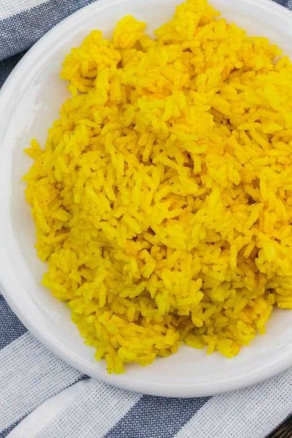 Step-by-step guide to cooking yellow rice in a rice cooker