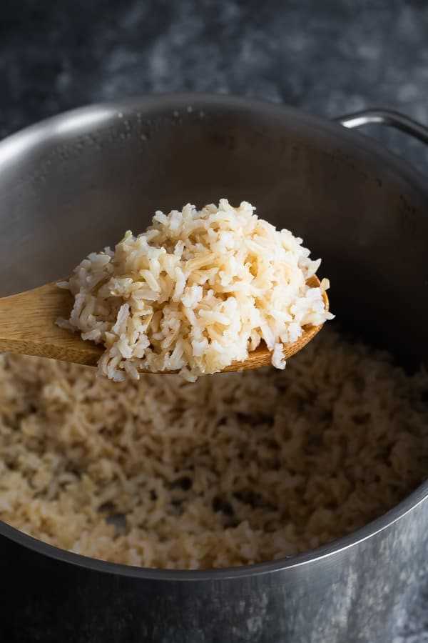 2. Does cooking brown rice in a rice cooker take longer than white rice?