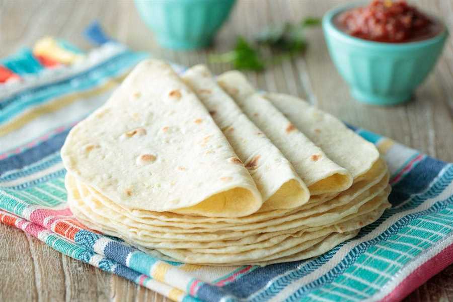 undefinedCooking increases nutrient availability</strong>“></p>
<p>Cooking flour tortillas also increases the availability of certain nutrients. Heating the tortillas helps to release certain vitamins and minerals that may not be as easily absorbed by the body in their raw state.</p>
<p>For example, cooking flour tortillas can increase the availability of B vitamins, which play a crucial role in energy production and maintaining a healthy nervous system. Cooking can also make minerals such as iron and zinc more bioavailable, allowing the body to better absorb and utilize them.</p>
<h3><strong>Enhanced taste and texture</strong></h3>
<p>Another benefit of cooking flour tortillas is that it enhances their taste and texture. Raw flour tortillas can have a bland and slightly doughy taste, but cooking them adds a delicious toasted flavor and a crispy texture.</p>
<p>Cooking also helps to soften the tortillas, making them more pliable and enjoyable to eat. The heat from cooking can help to activate the gluten in the flour, giving the tortillas a desirable chewiness.</p><div class='code-block code-block-6' style='margin: 8px 0; clear: both;'>
</div>

<p>Overall, cooking flour tortillas not only improves their digestion but also enhances their nutritional value and taste. So, next time you have flour tortillas, consider cooking them for a better culinary experience.</p>
<h2>Recipes and Varieties</h2>
<p>Flour tortillas are a versatile ingredient that can be used in a variety of recipes. Here are some delicious ways to enjoy them:</p>
<h3>Tacos</h3>
<p>Tacos are a classic Mexican dish that can be filled with a variety of ingredients. Fill your flour tortillas with seasoned meat, beans, vegetables, and your favorite toppings such as salsa, guacamole, and cheese.</p>
<h3>Quesadillas</h3>
<p>Quesadillas are a quick and easy snack or meal. Simply fill your flour tortillas with cheese and any other fillings you desire, such as grilled vegetables or cooked chicken. Cook them on a griddle or in a skillet until the cheese is melted and the tortillas are crispy.</p>
<h3>Enchiladas</h3>
<p>Enchiladas are a delicious Mexican dish made with rolled tortillas filled with meat, cheese, or beans, and topped with sauce and cheese. Dip your flour tortillas in warm enchilada sauce, fill them with your desired filling, roll them up, and bake until the cheese is melted and bubbly.</p><div class='code-block code-block-7' style='margin: 8px 0; clear: both;'>
</div>

<h3>Burritos</h3>
<p>Burritos are a satisfying and filling meal option. Fill your flour tortillas with rice, beans, meat, and your favorite toppings such as sour cream, salsa, and guacamole. Roll them up tightly and enjoy!</p>
<div style=